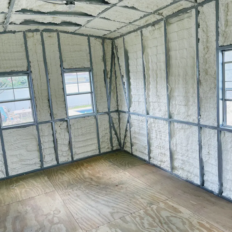 Closed-cell spray foam insulation applied to wall cavities in a residential project in Bethel